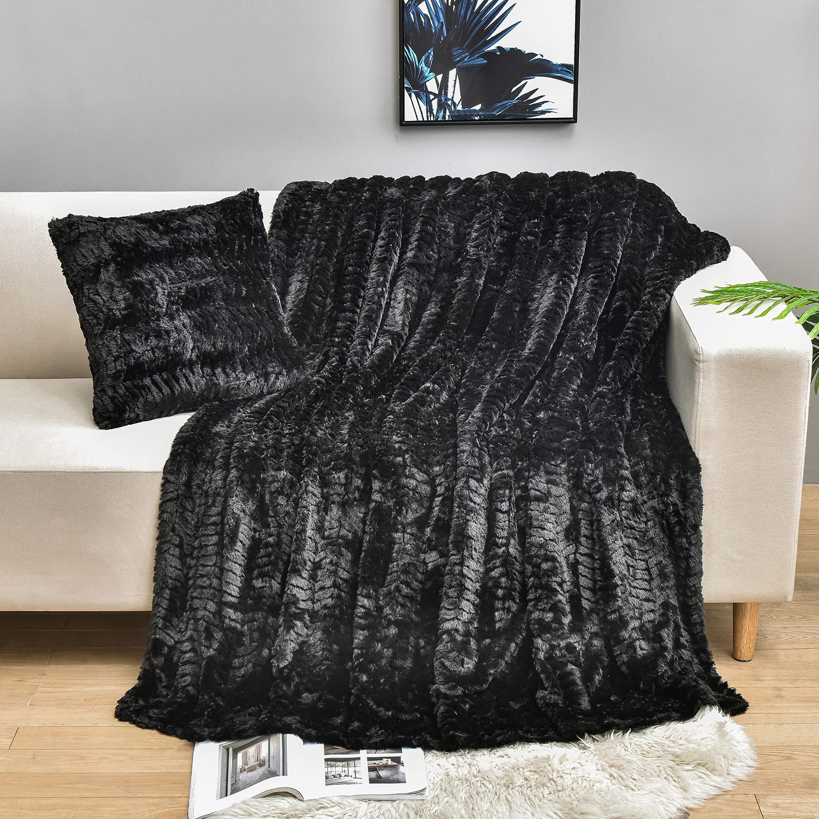 YUSOKI front view of black throw showing plush coverage and elegant finish