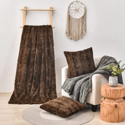YUSOKI layered on bed showing how the throw elevates bedding