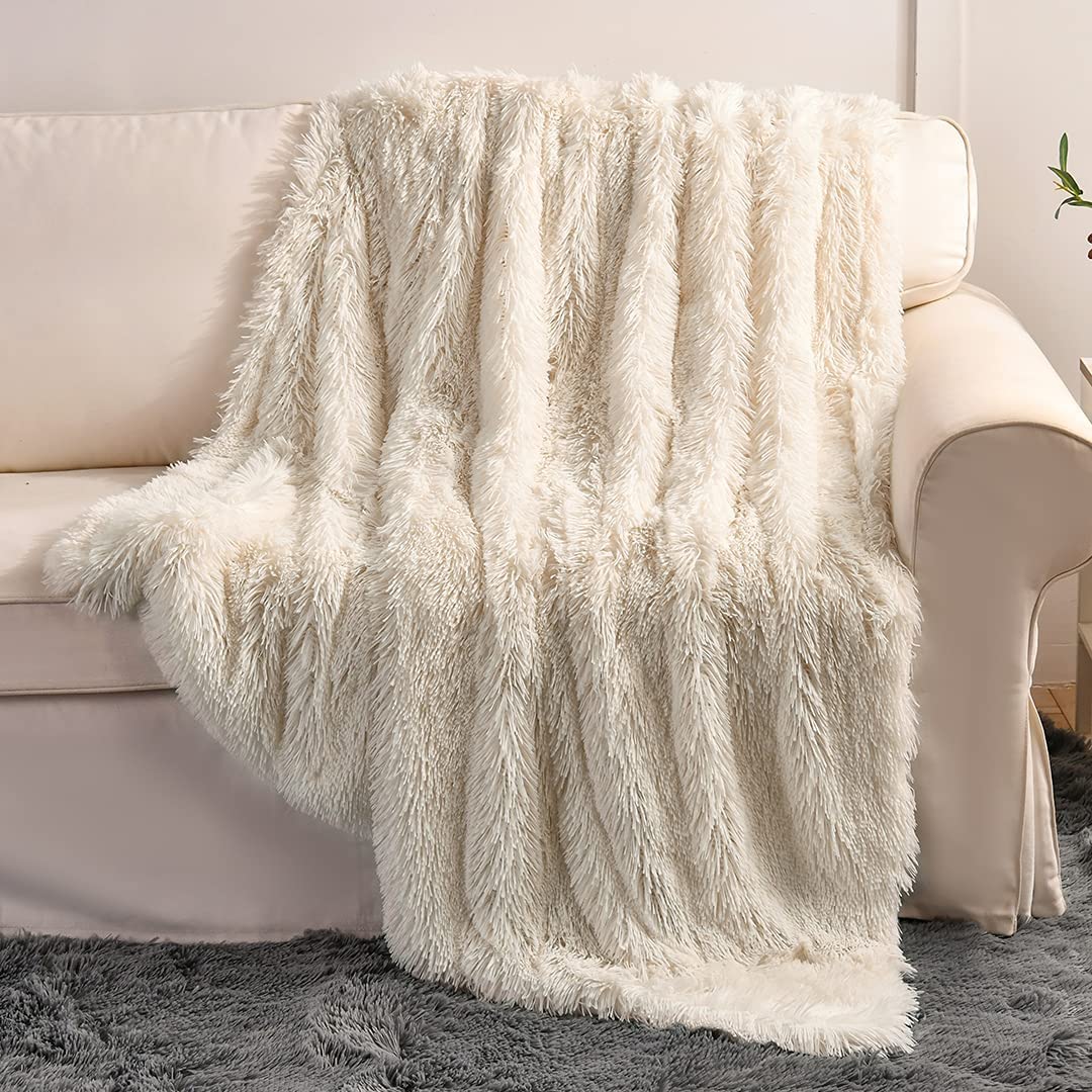 YUSOKI cream throw front folded showing plush look and cozy comfort