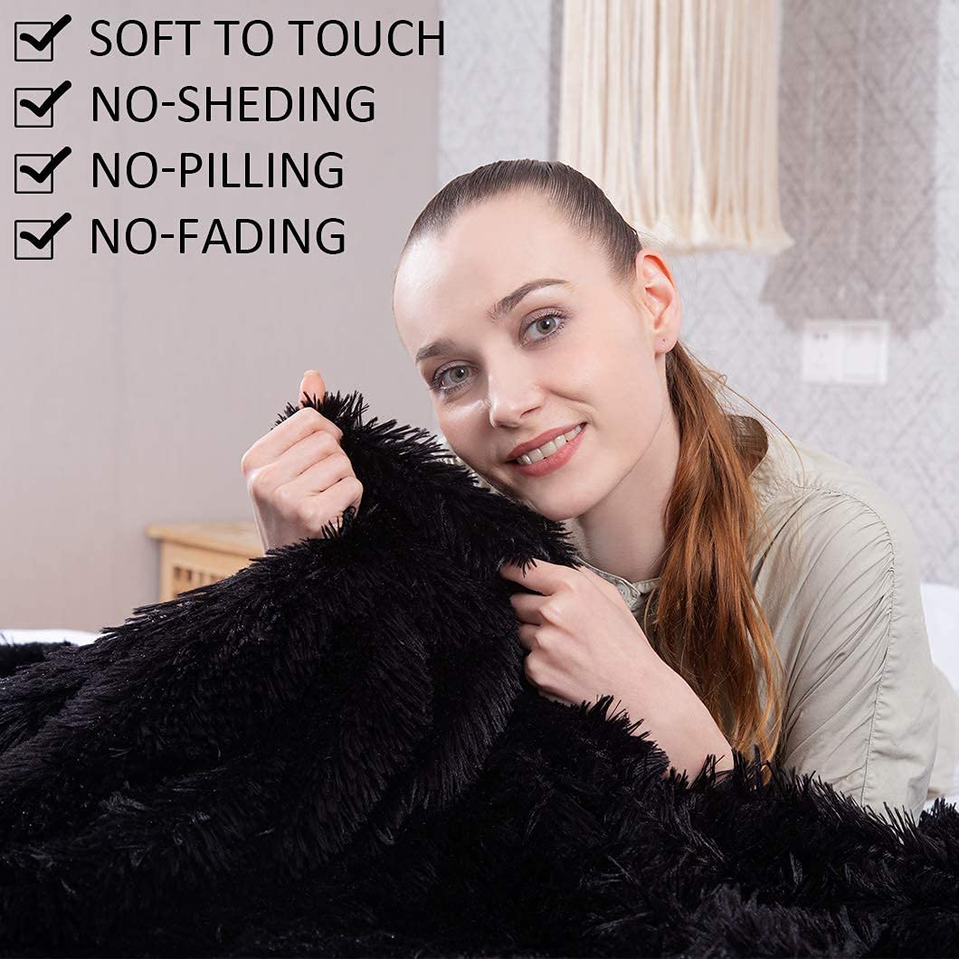 YUSOKI draped over a twin bed demonstrating full 60x80 coverage and warmth