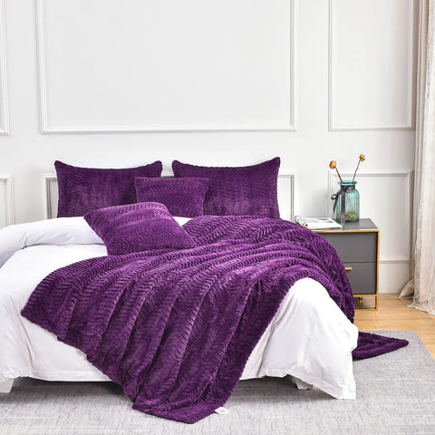 YUSOKI draped over bed footboard illustrating generous 50x63 size and layered design benefit