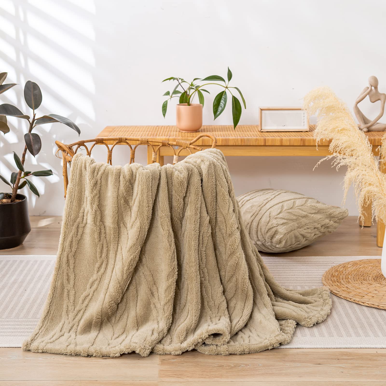 YUSOKI draped over a sofa illustrating cozy styling and easy living-room use