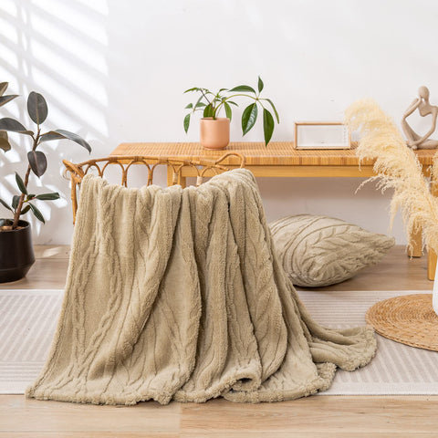 YUSOKI draped over a sofa illustrating cozy styling and easy living-room use