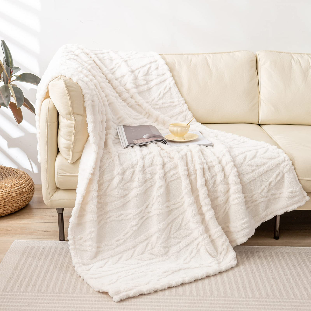 YUSOKI ivory throw front view showing decorative boho texture and cozy look