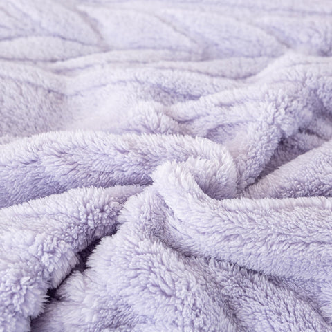 YUSOKI spread across a bed displaying full coverage and color