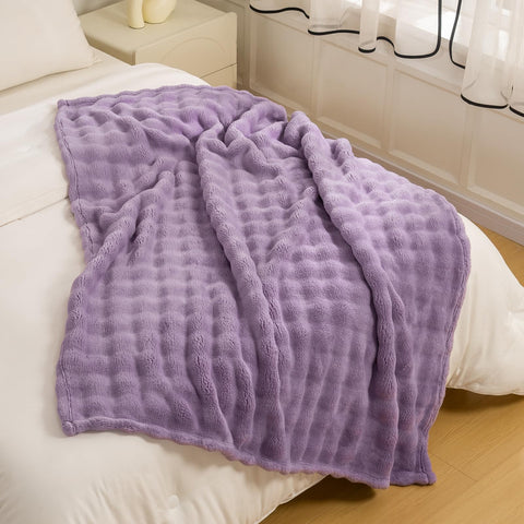 YUSOKI lilac blanket on bed showing decorative appeal and layered comfort