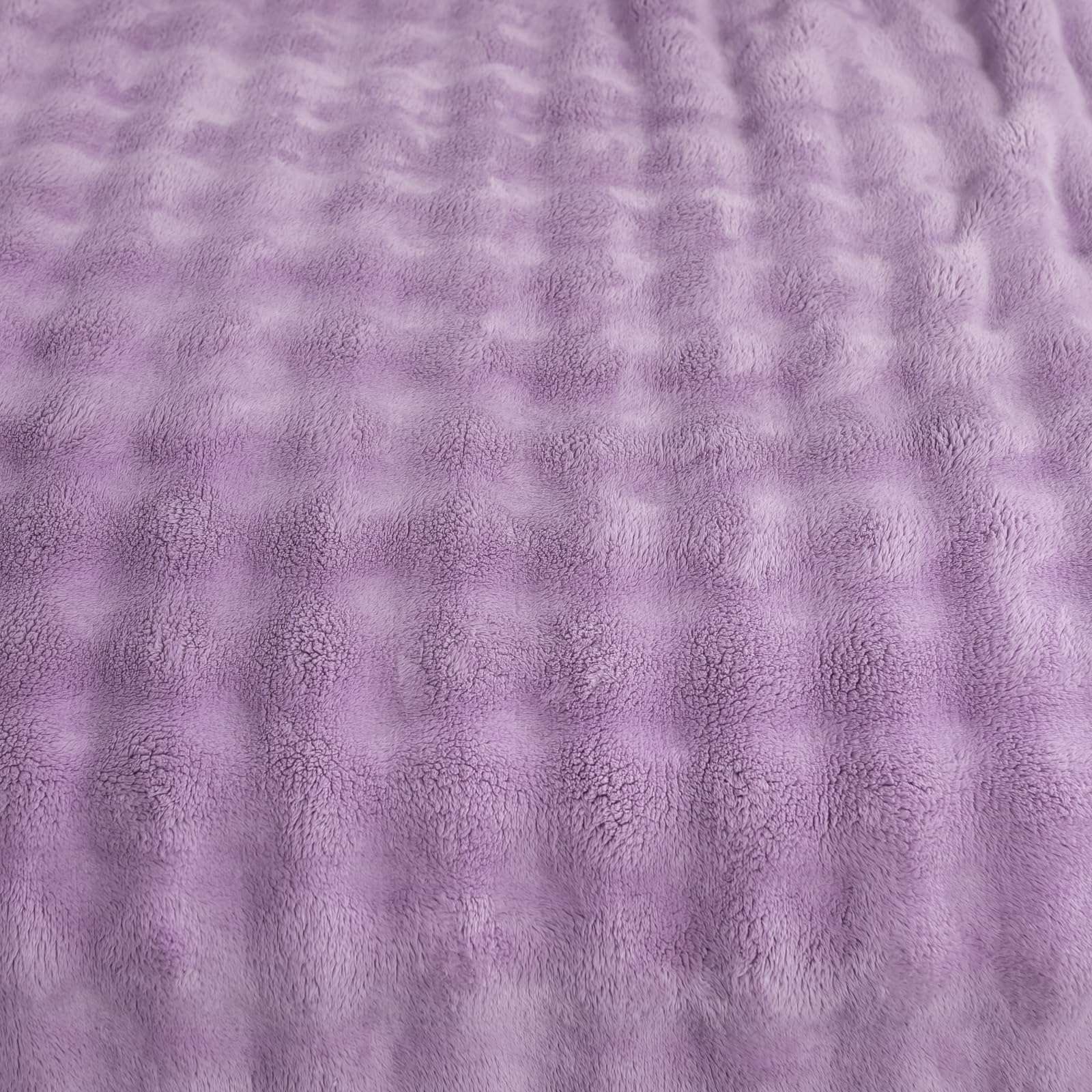 YUSOKI hand pressing bubble texture showing softness and touch benefit
