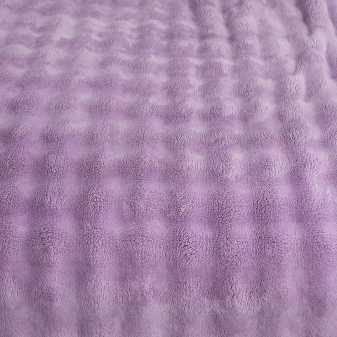 YUSOKI hand pressing bubble texture showing softness and touch benefit