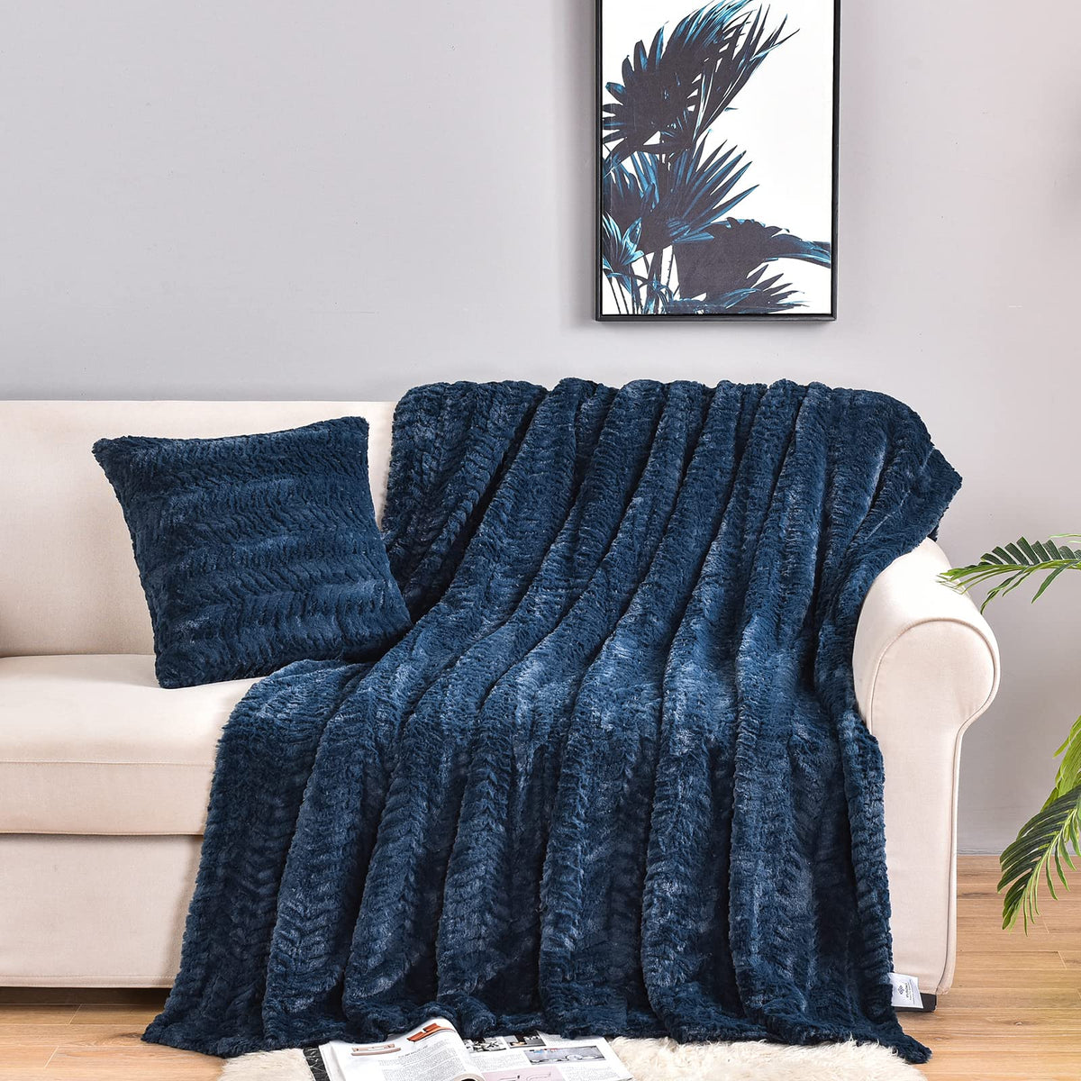 YUSOKI navy blue throw front view showing plush finish and inviting softness