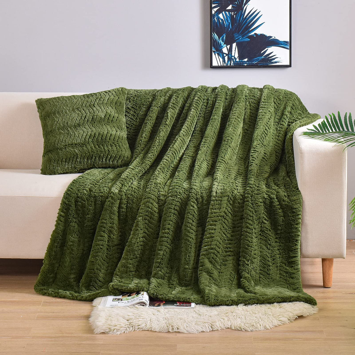 YUSOKI olive green throw folded showing plush front and elegant drape, adds cozy style