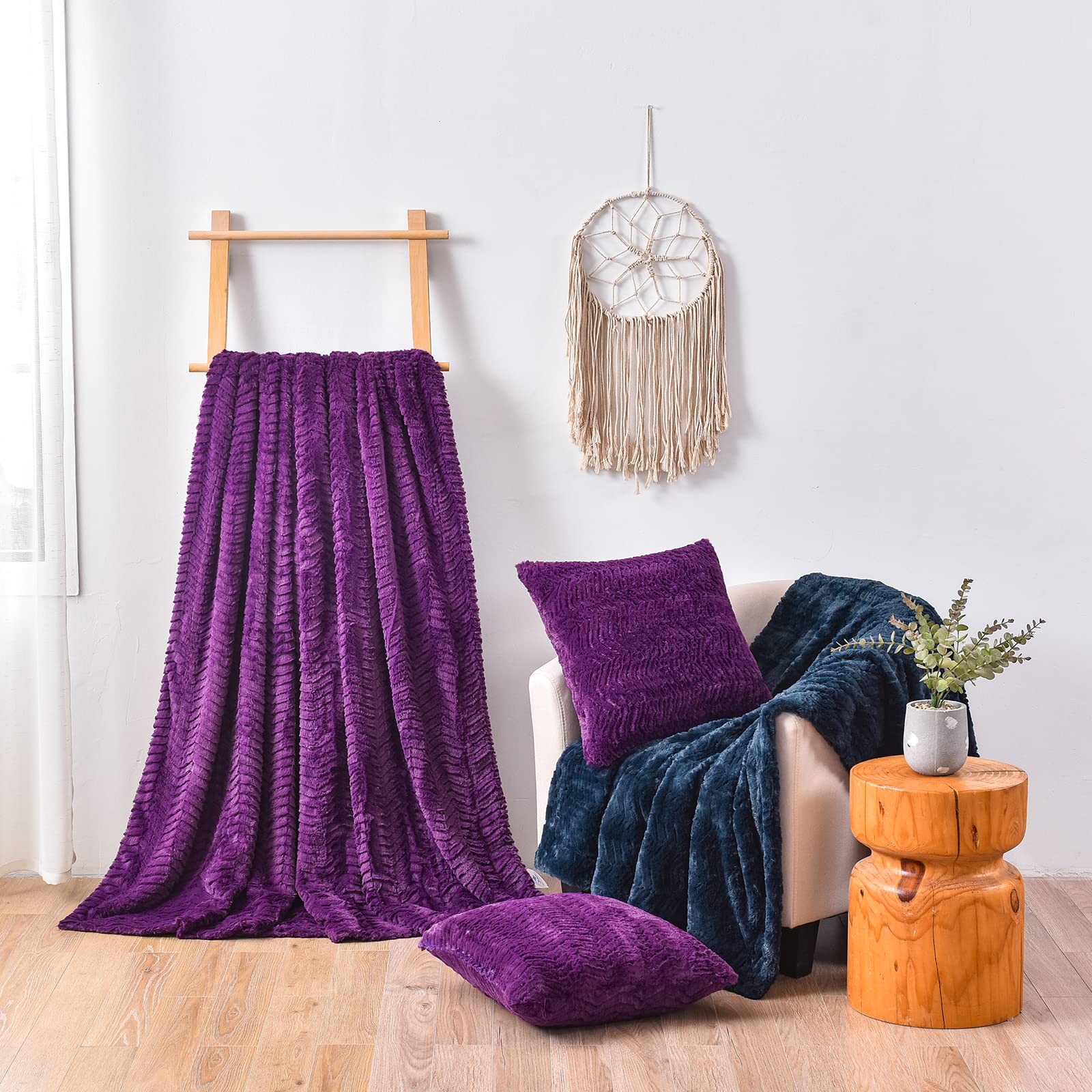 YUSOKI throw styled on sofa in living room adding deep-plum contrast and instant coziness