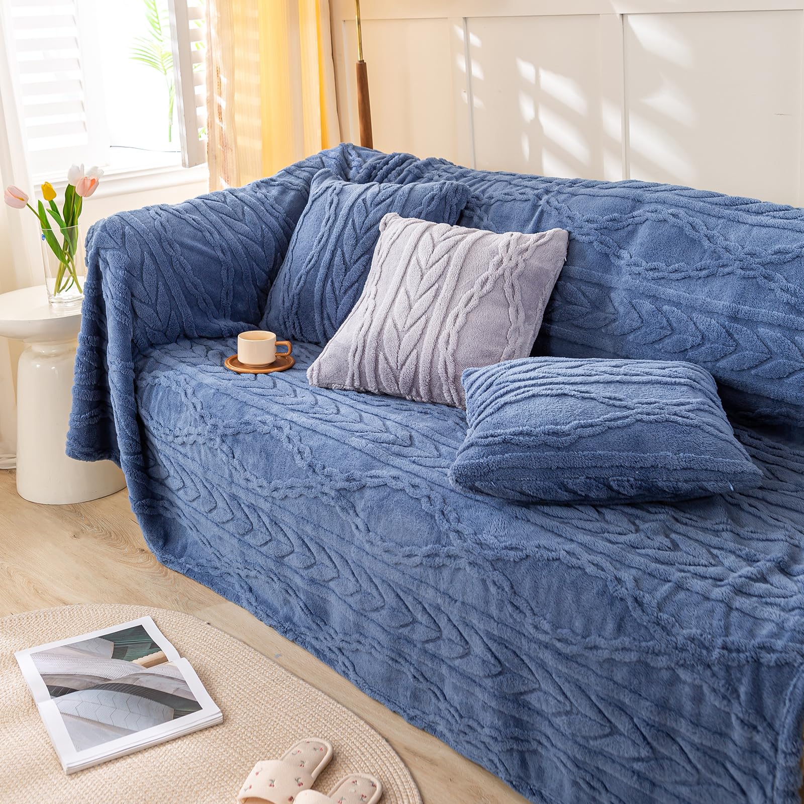 YUSOKI folded throw on sofa adding color and comfortable layering