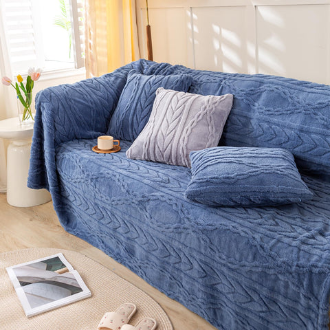 YUSOKI folded throw on sofa adding color and comfortable layering