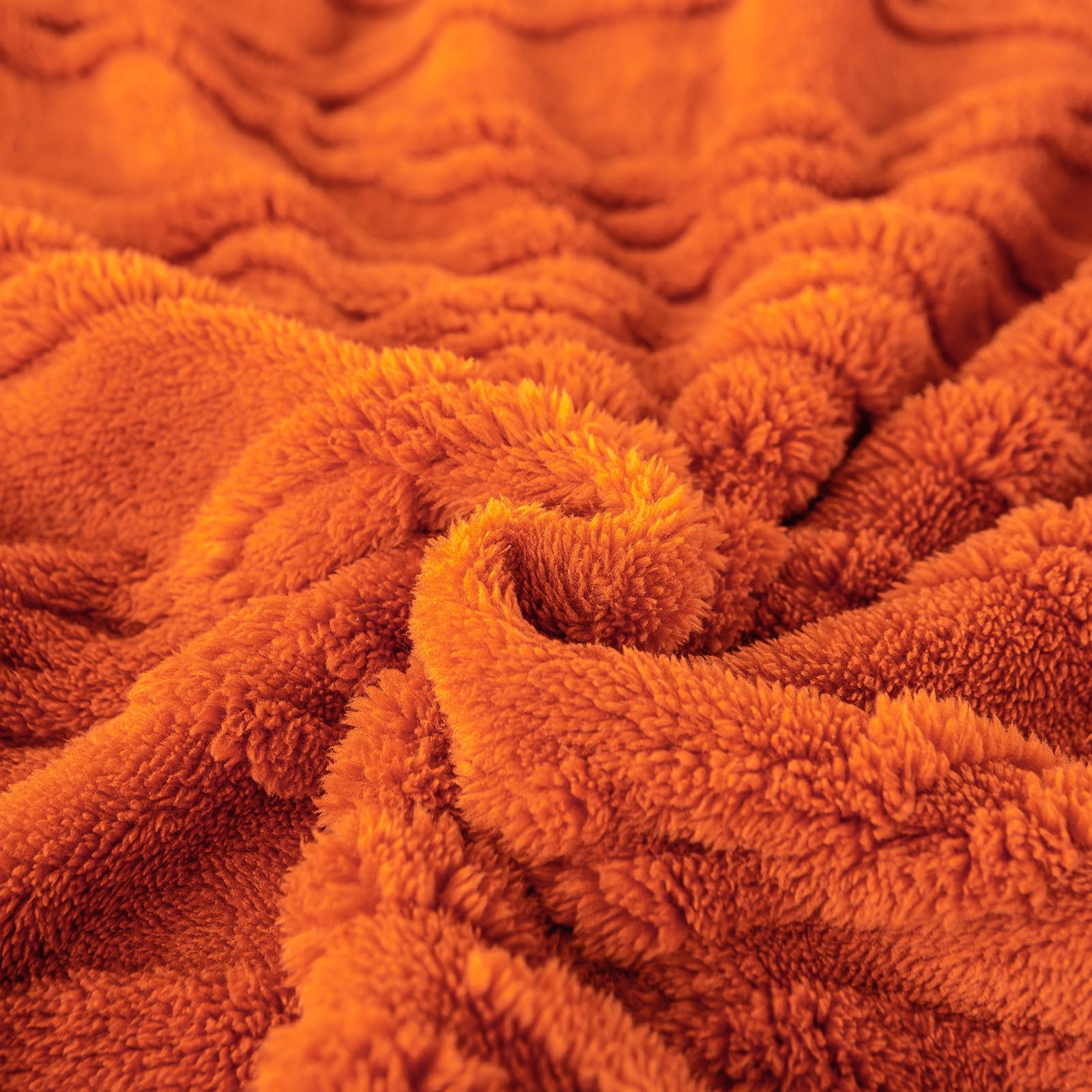 YUSOKI blanket size comparison on couch showing generous coverage