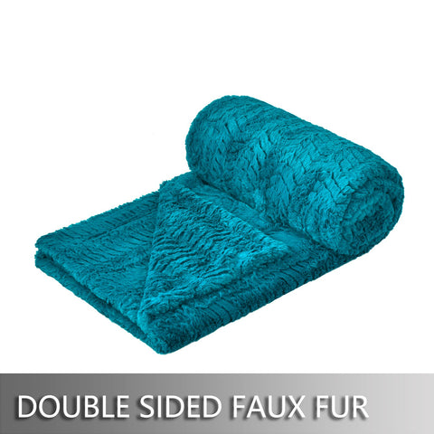 YUSOKI folded throw on bed showing oversized 50x63 coverage