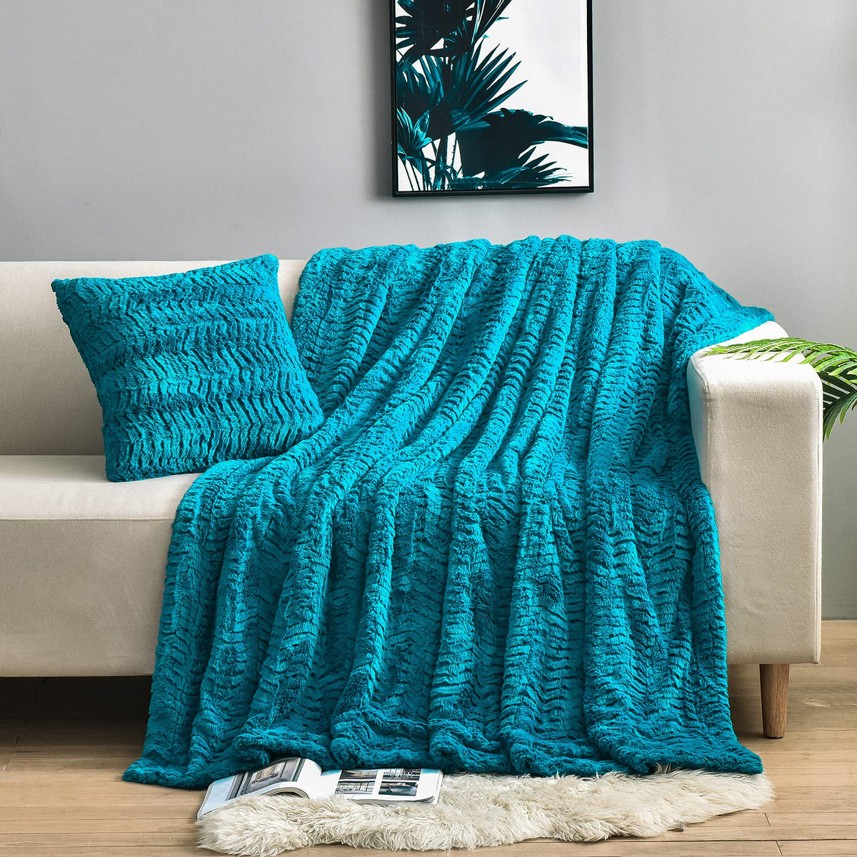 YUSOKI teal throw draped on sofa showing plush decor appeal