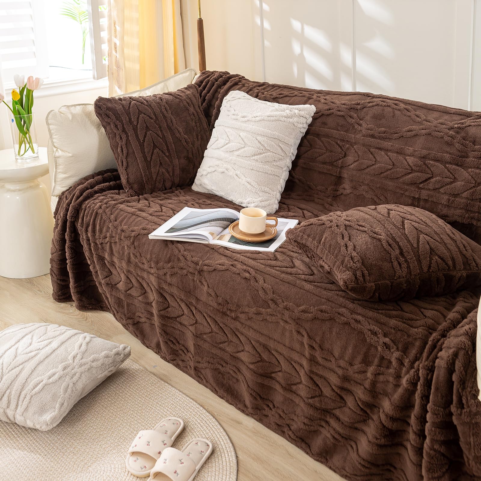 YUSOKI draped over bed footboard adding layered bedroom style
