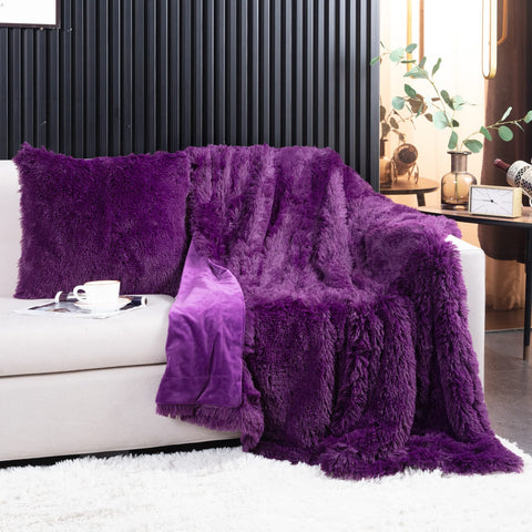 YUSOKI throw draped on sofa demonstrating decorative, cozy look