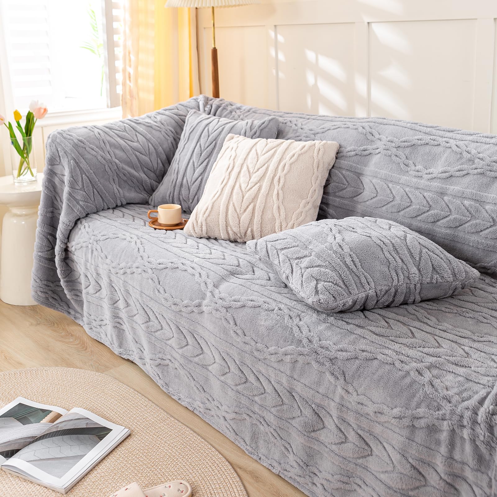 YUSOKI draped over a sofa demonstrating cozy lounging and living-room style benefit
