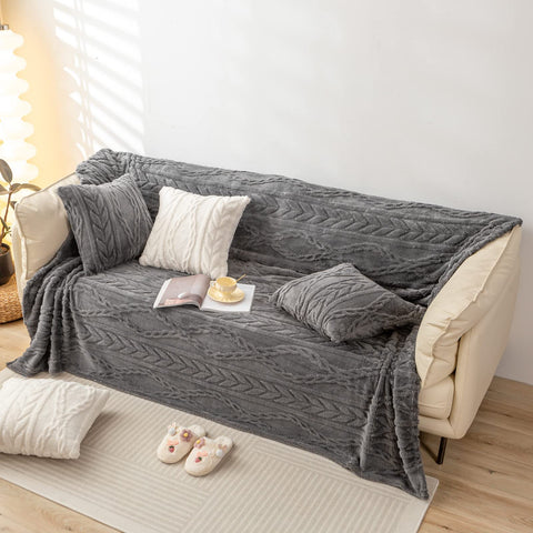 YUSOKI throw folded on bed showing extra coverage and neat appearance