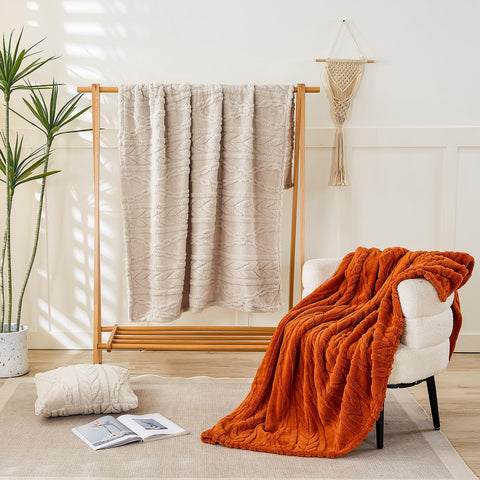YUSOKI folded throw on shelf illustrating compact storage and portability