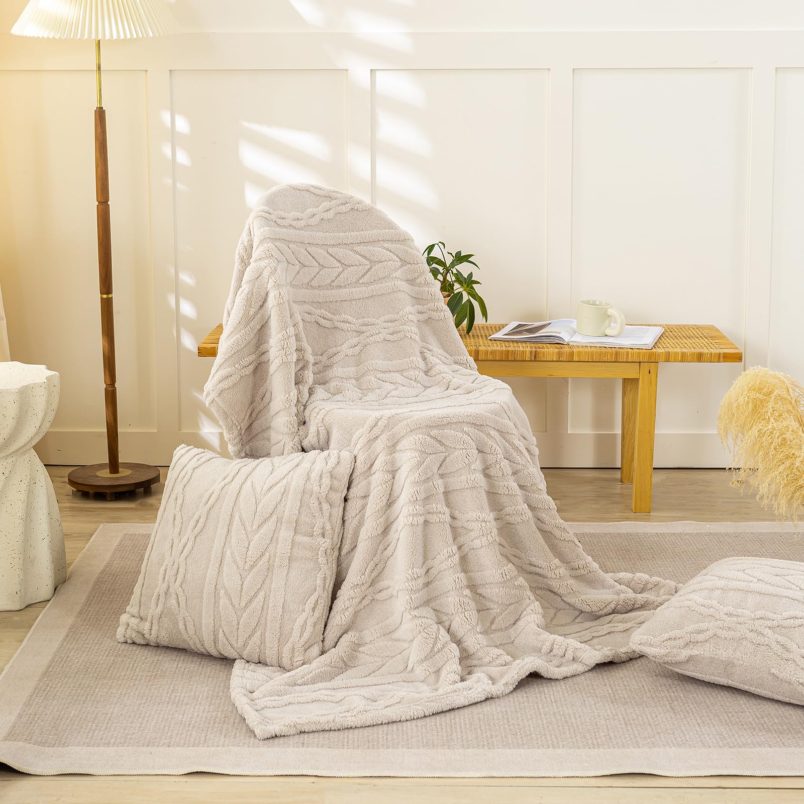 YUSOKI throw at foot of bed showing layered bedroom styling benefit