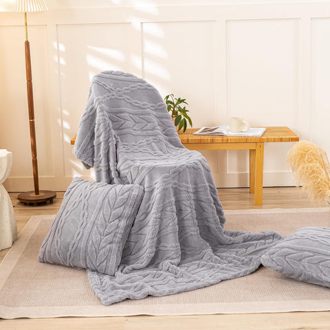 YUSOKI laid across a bed showing oversized coverage and layering benefit