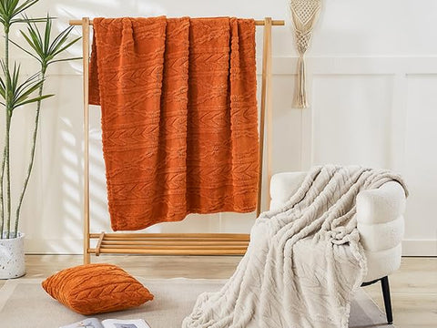 YUSOKI throw draped on sofa showing cozy living room styling