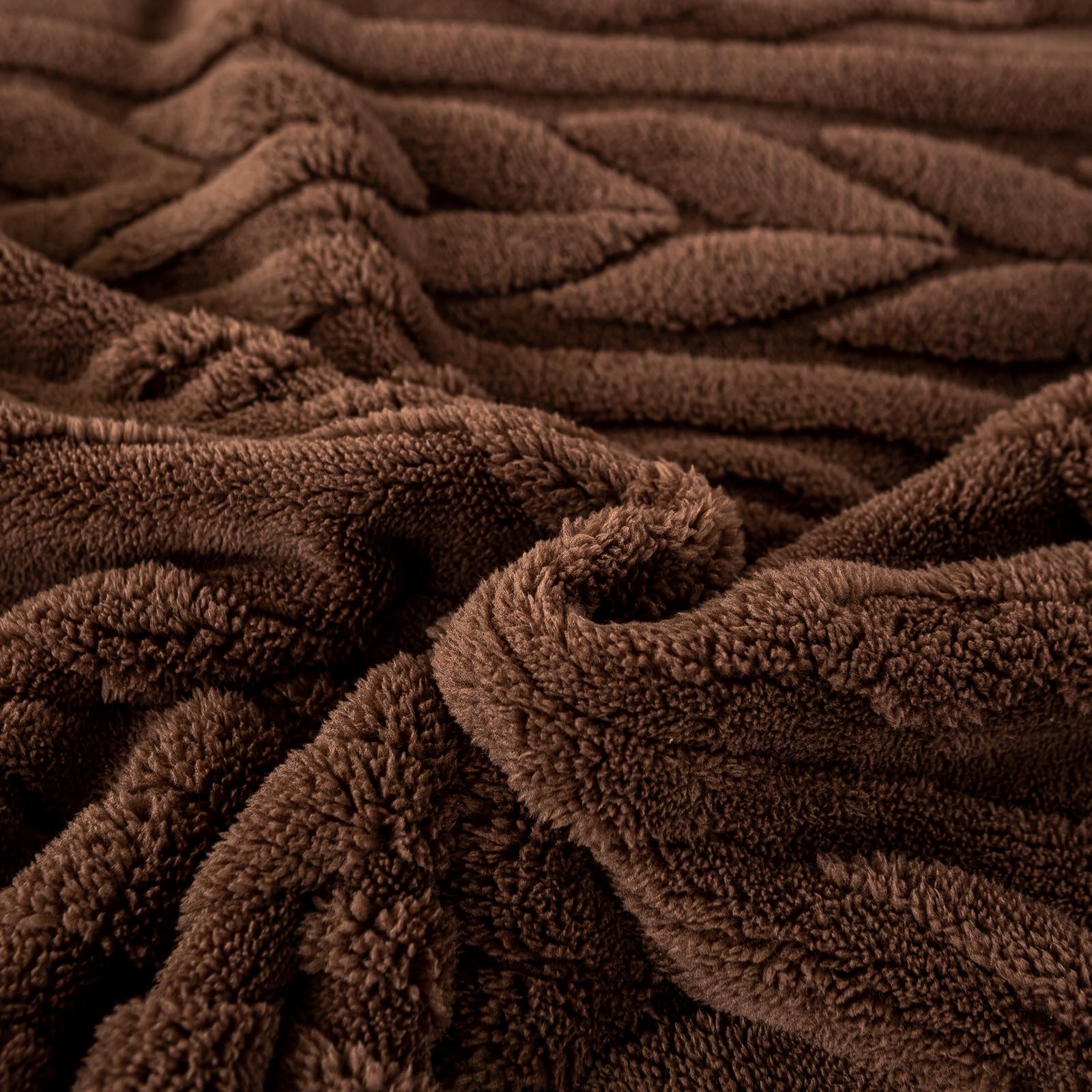 YUSOKI size comparison on chair demonstrating 50x65 oversized coverage