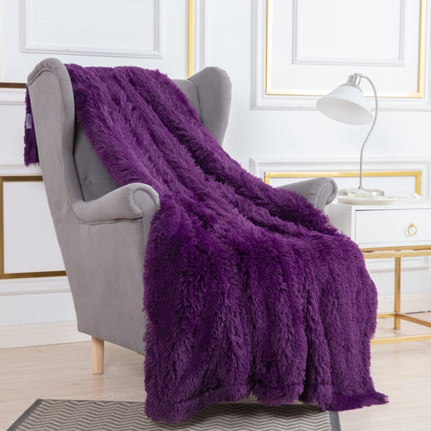 YUSOKI throw beside a book showing 50x60 size and real scale