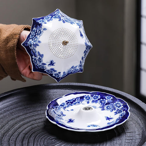 YUTICAT umbrella strainer rotating top detail demonstrating smooth 360-degree movement