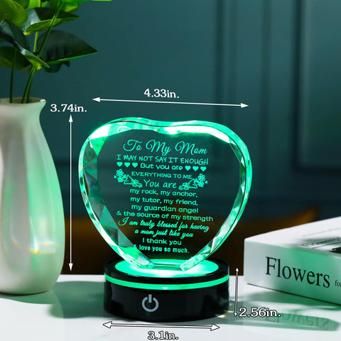 YWHL hand holding keepsake for scale, demonstrates ideal tabletop size