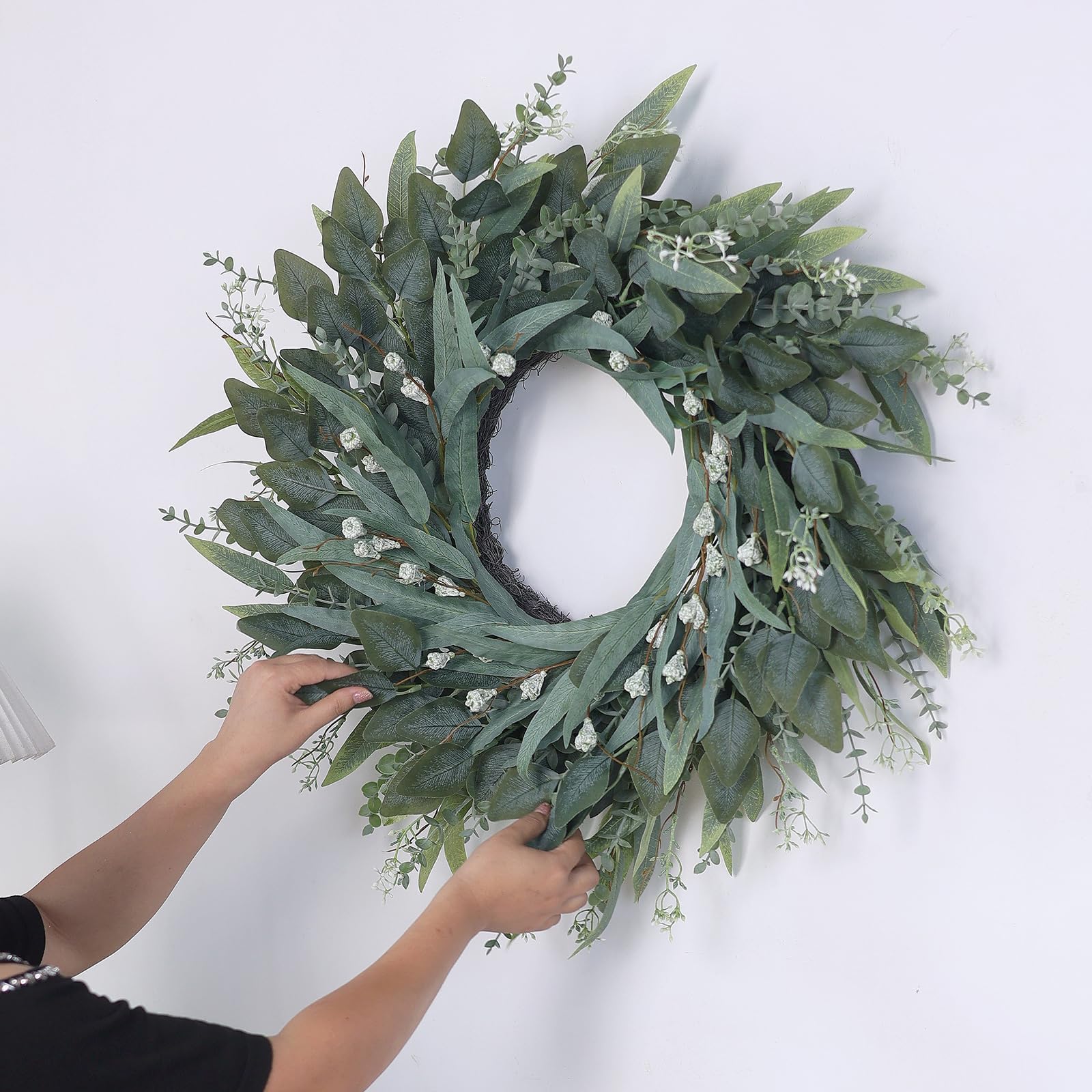 YXZZWL wreath beside door frame showing true size and scale