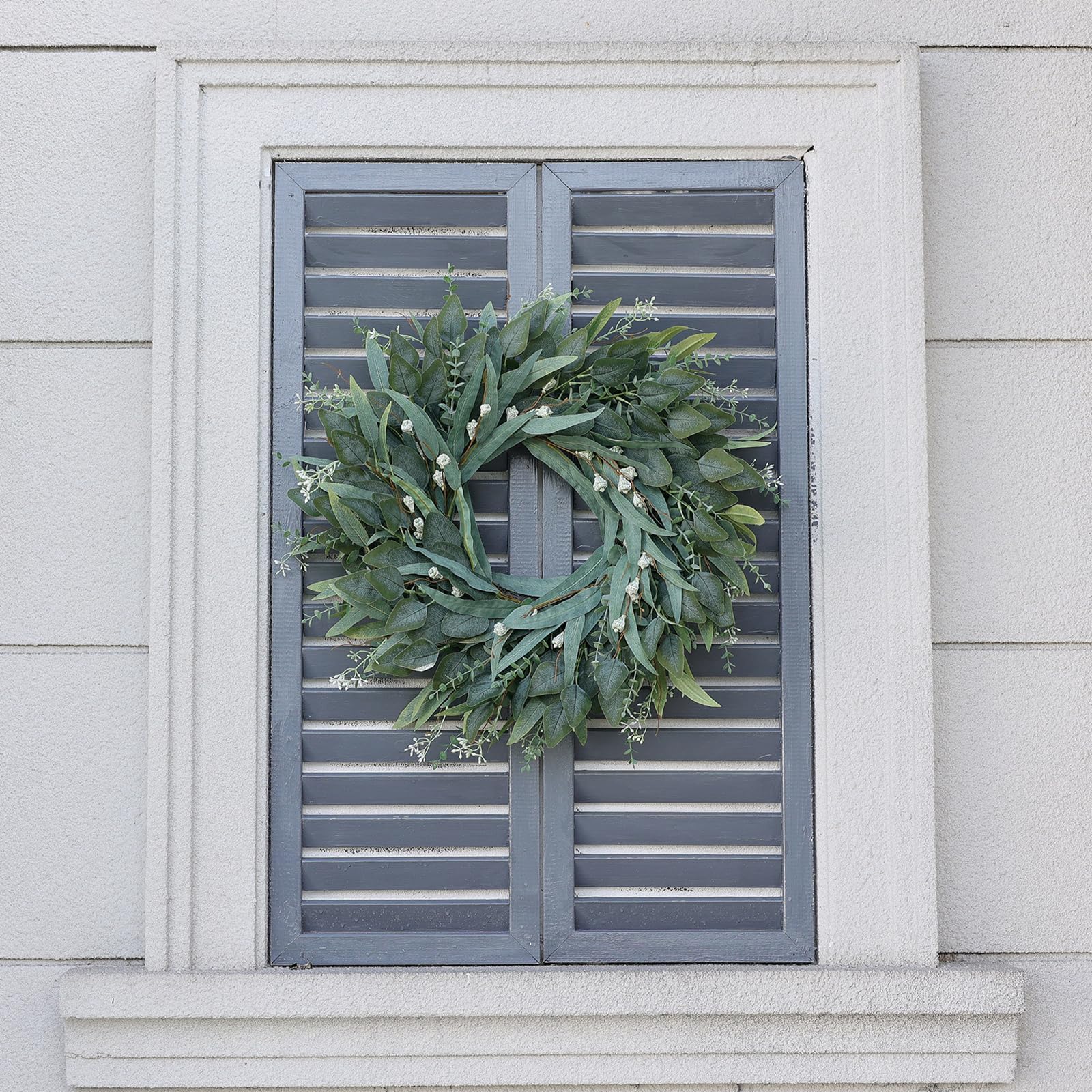 YXZZWL wreath styled with bow for seasonal decorating versatility