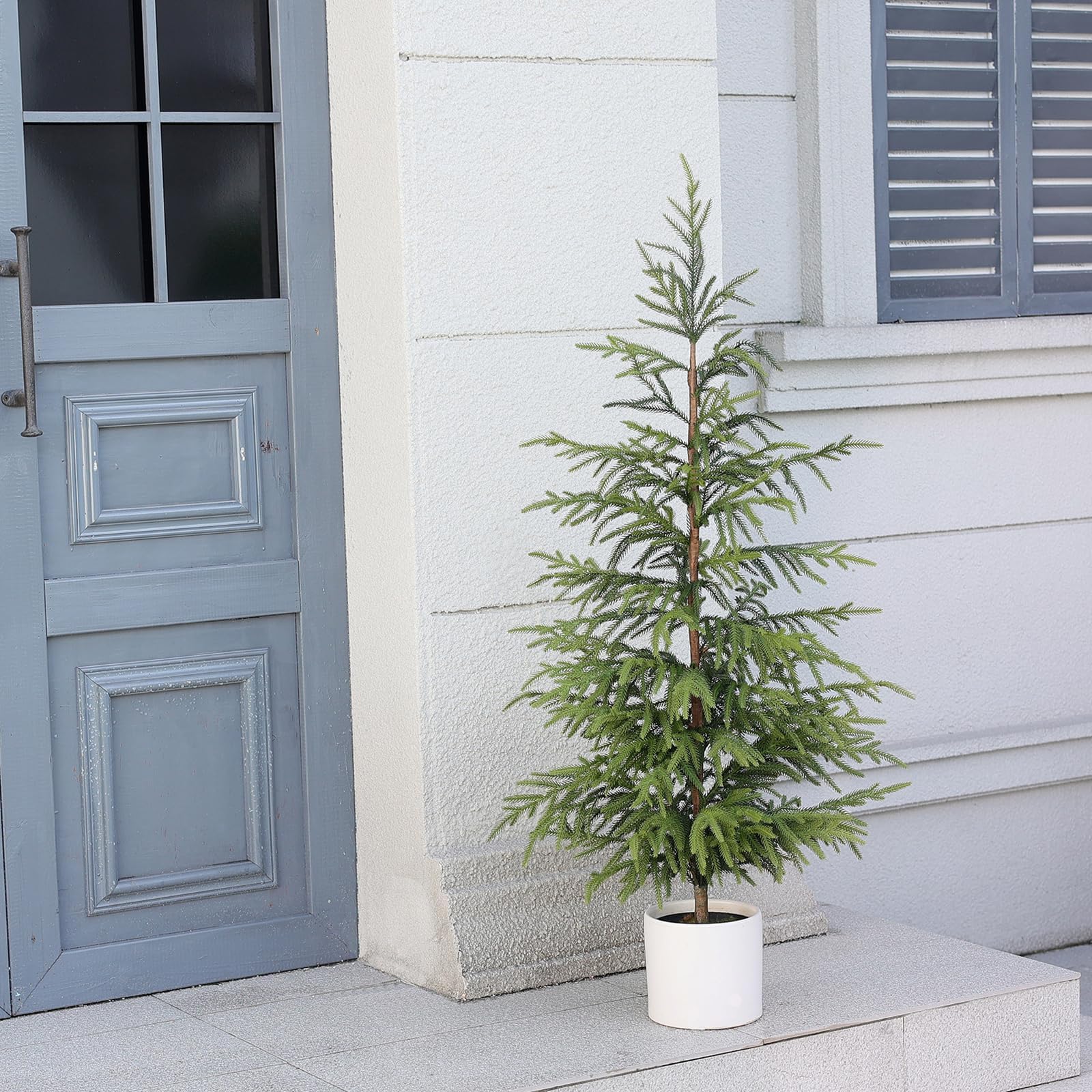 YXZZWL tree decorated with lights demonstrating festive, low-maintenance decor