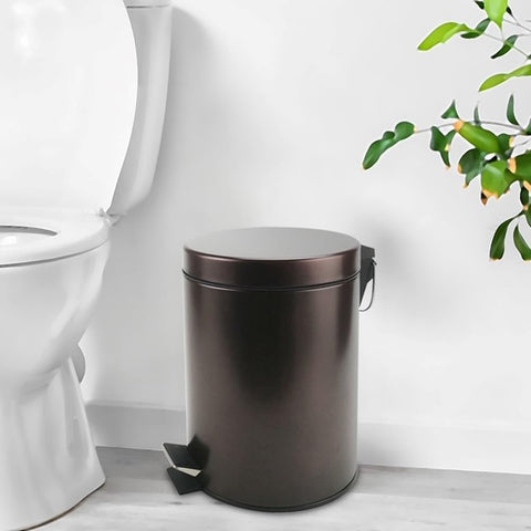 Zahari Home bronze trash can front view showing compact design and pedal for hands-free use