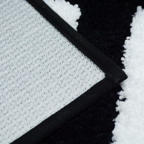 Zeeinx folded rug ready for machine wash highlighting easy-care feature