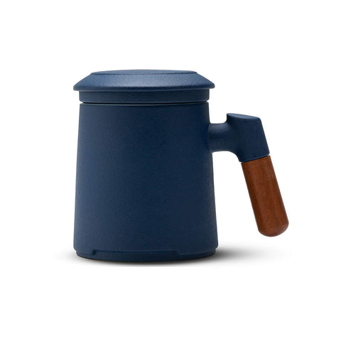 ZENS blue mug front view showing ceramic glaze and infuser benefit of even steeping