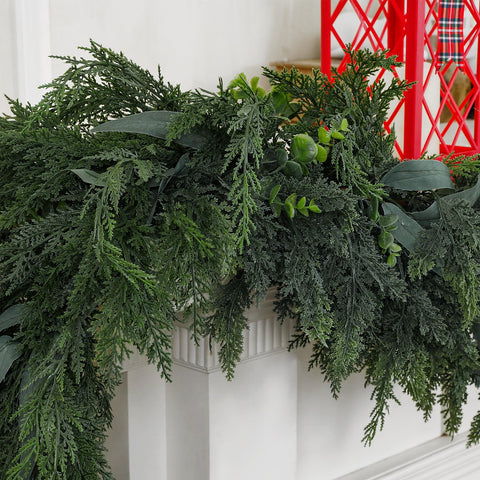 Zesua cedar garland wrapped around banister demonstrating flexible shaping benefit