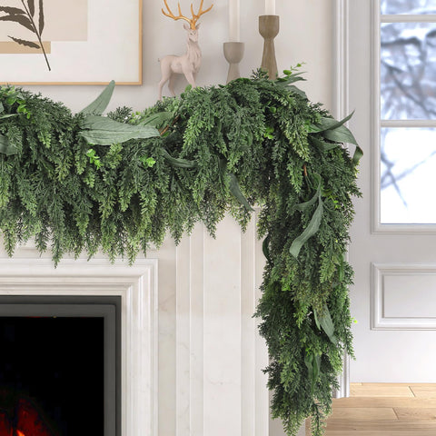 Zesua garland next to a hand to show six-foot scale for planning placement