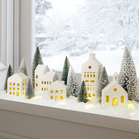 Zesua mini snowy trees next to houses showing realistic scaled scene