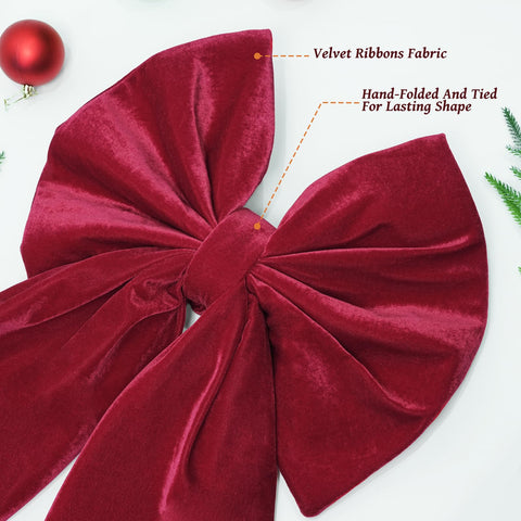 Zesua bow used as tree topper adding instant focal point and height