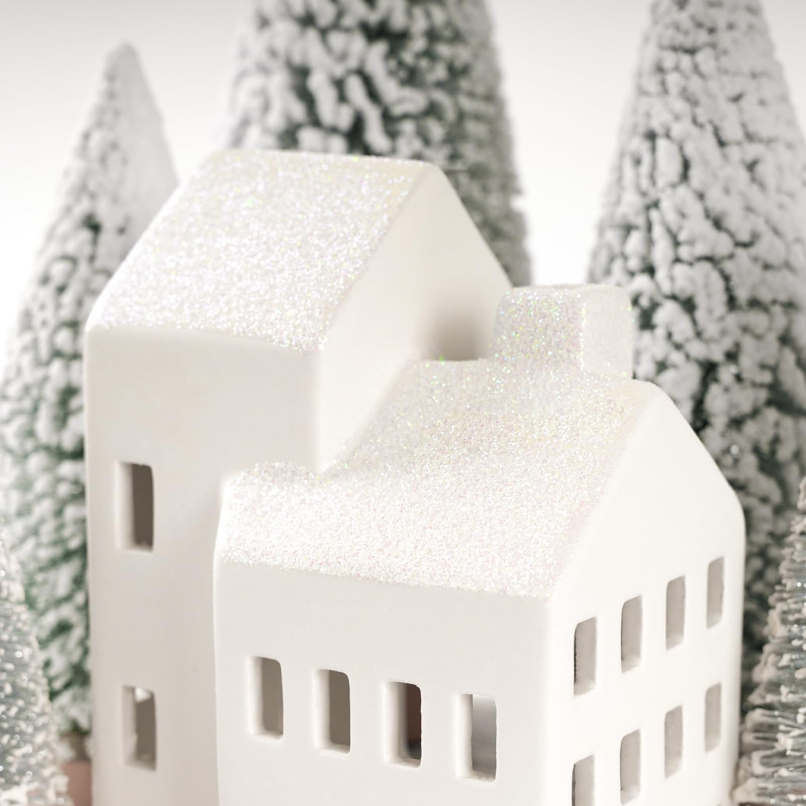 Zesua village displayed on mantel creating a warm seasonal focal point
