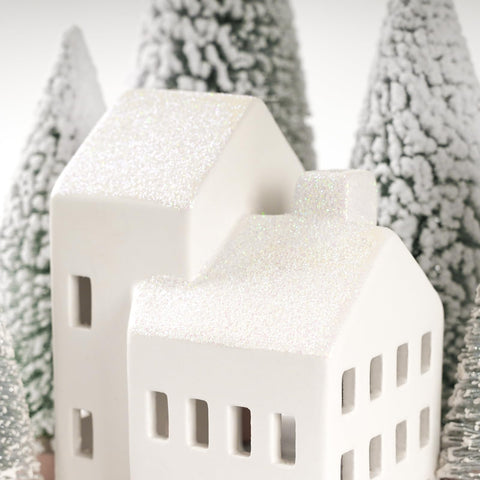 Zesua village displayed on mantel creating a warm seasonal focal point