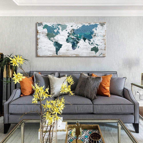ZEYDRT teal world map hung above bed showing bedroom ambiance enhancement