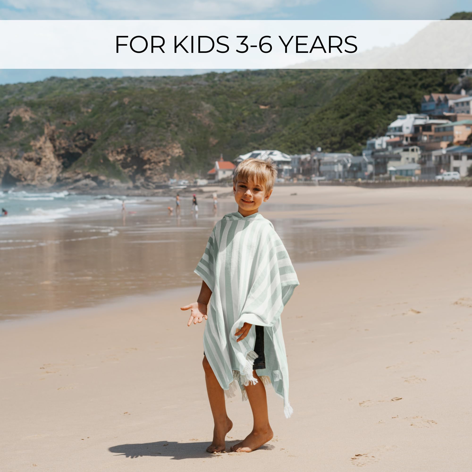 ZICOTO child wearing beach poncho enjoying hands-free drying