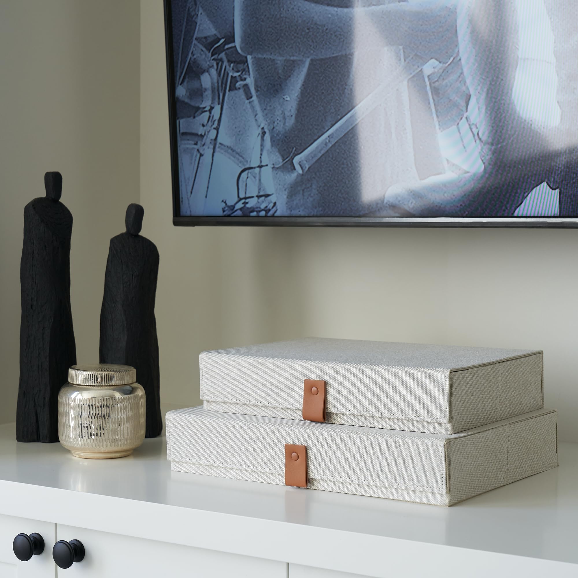 ZICOTO box next to photo sheets showing scale and capacity for standard prints