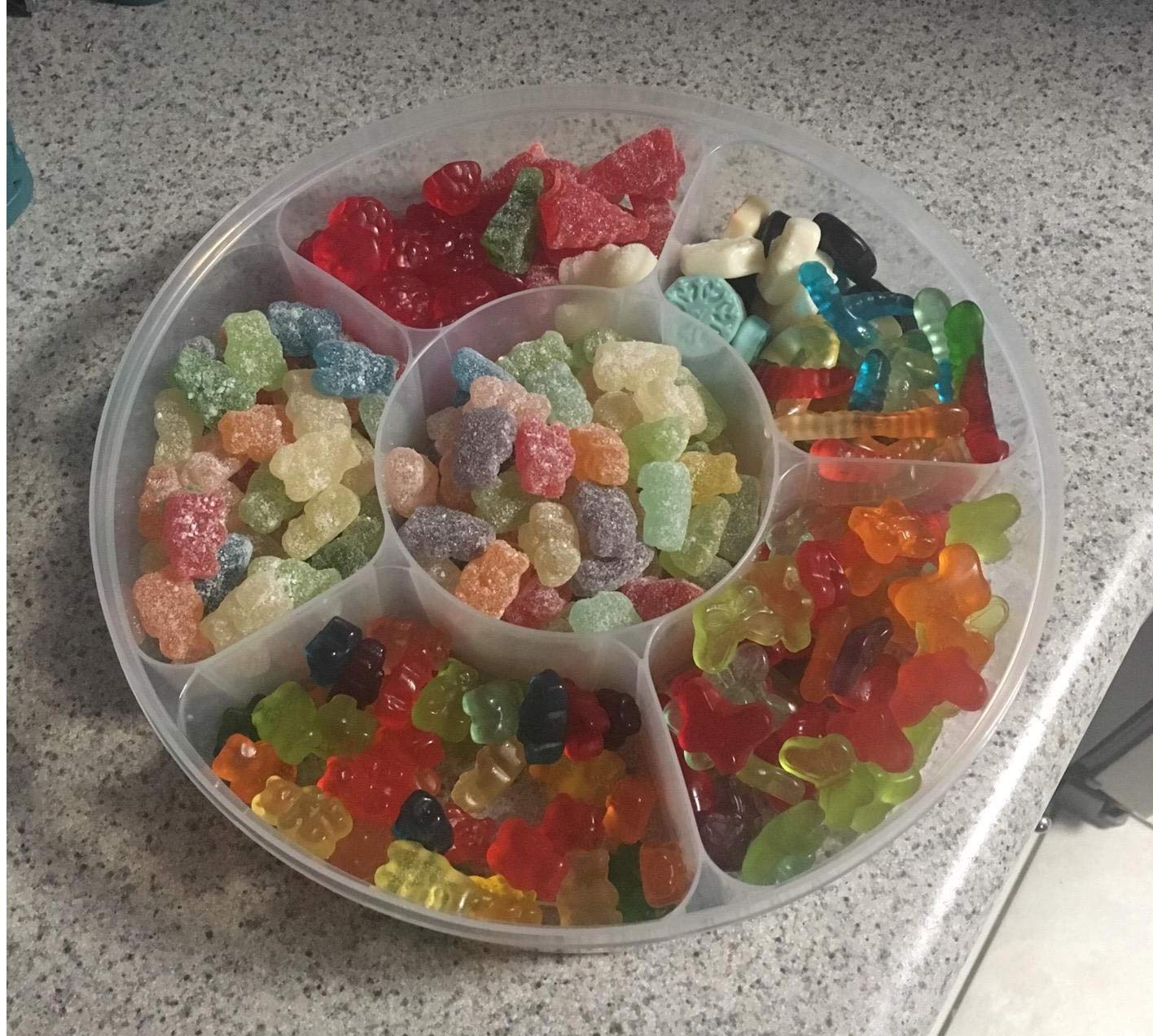 Zilpoo in kids lunchbox use displaying portioned fruits and cheeses for school lunches