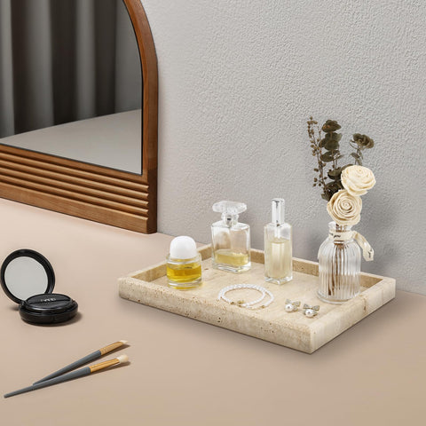 Zilukar travertine tray holding jewelry and perfume for elegant display