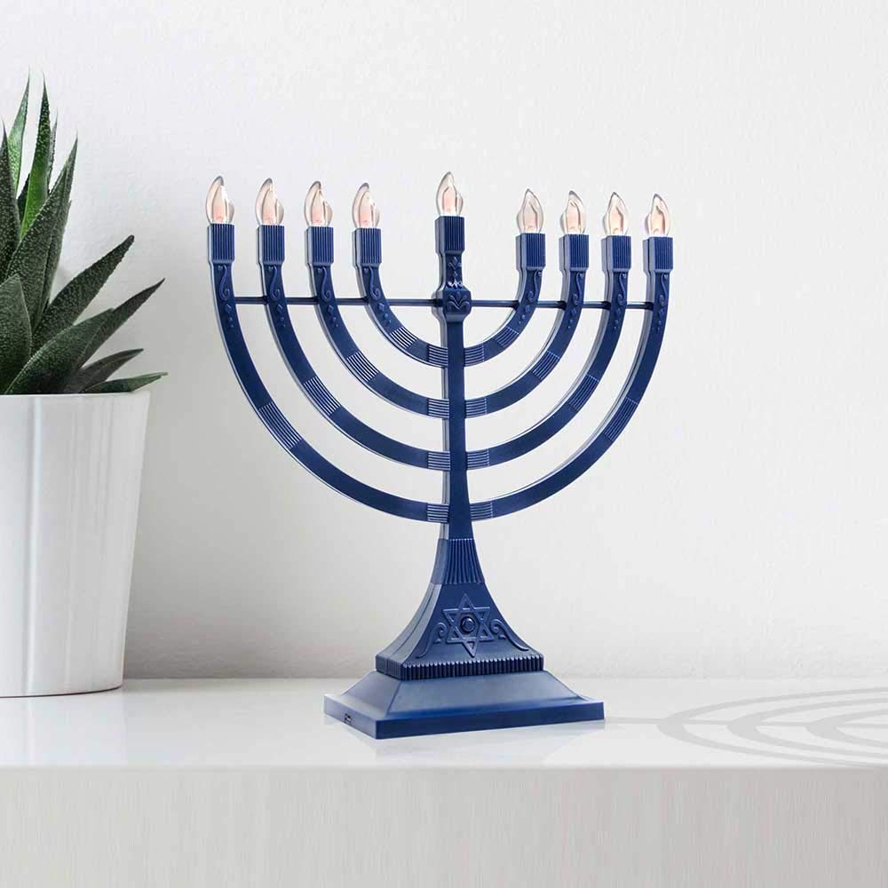 Zion Judaica menorah side profile showing slim silhouette and sturdy construction